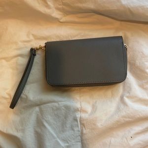 Super cute grey wallet! Never used. In great condition.